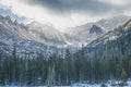 Continental Divide II - The Spires, granite spires above a frozen lake, Colorado