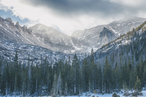Continental Divide II - The Spires, granite spires above a frozen lake, Colorado