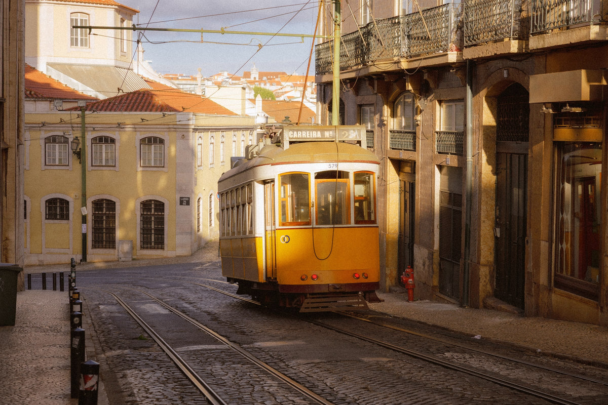 Lisbon Trams V - The Corner, a yellow tram rounding a street corner, Lisbon