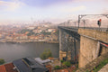 Portugal IV - Luis I bridge in mist over the Douro, Porto
