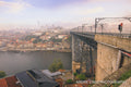 The Dom Luis I bridge over the Douro in morning mist, Porto